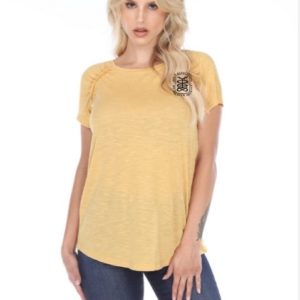 Girl wearing yellow YAGD t-shirt
